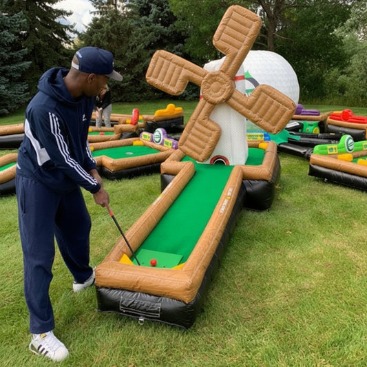 Man playing putt-putt golf on a mobile mini golf course rental at an event in Rochester, NY.