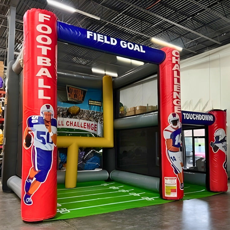 Football challenge inflatable game setup indoors.