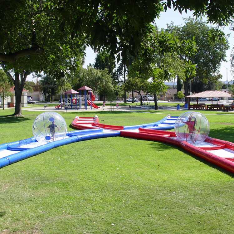 Two Players Racing on the C4 Criss Cross Inflatable Rental in Rochester, NY