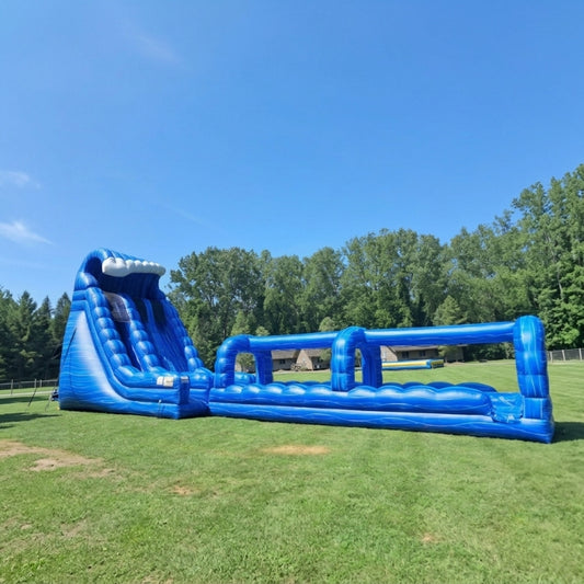 Giant Water Slide inflatable rental setup outdoors for a Summer Camp Event in Macedon, NY.