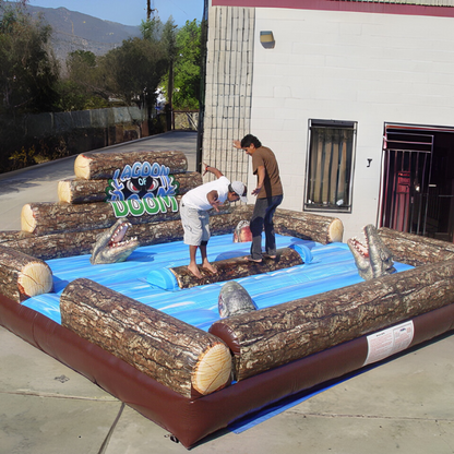 Lagoon of Doom Interactive Inflatable Rental Being Used By Two Players