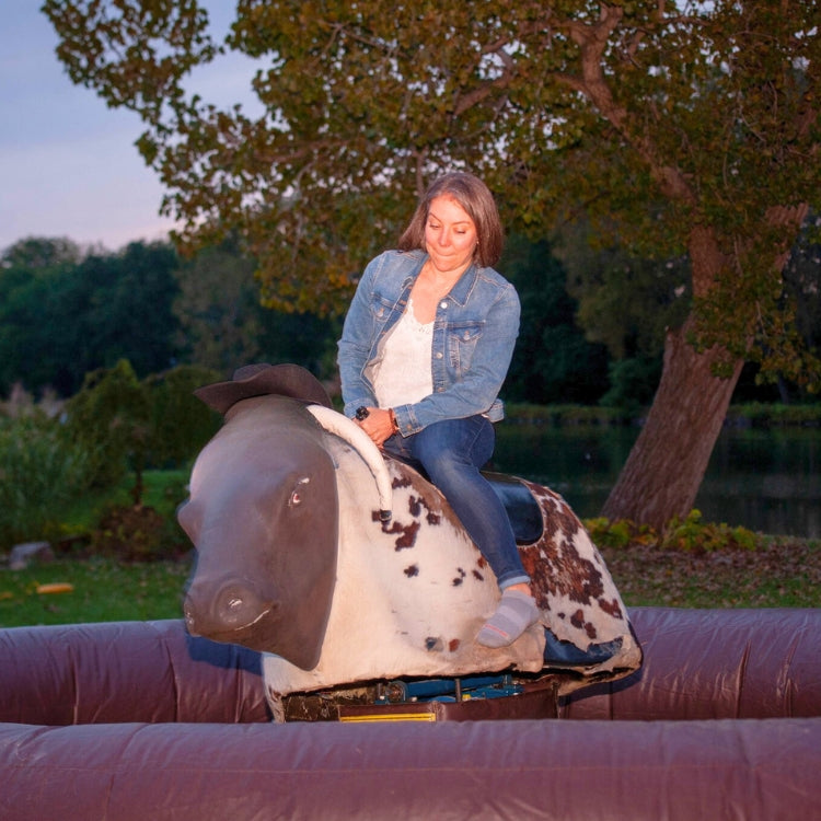 Woman Riding Mechanical Bull Rental in Buffalo, NY