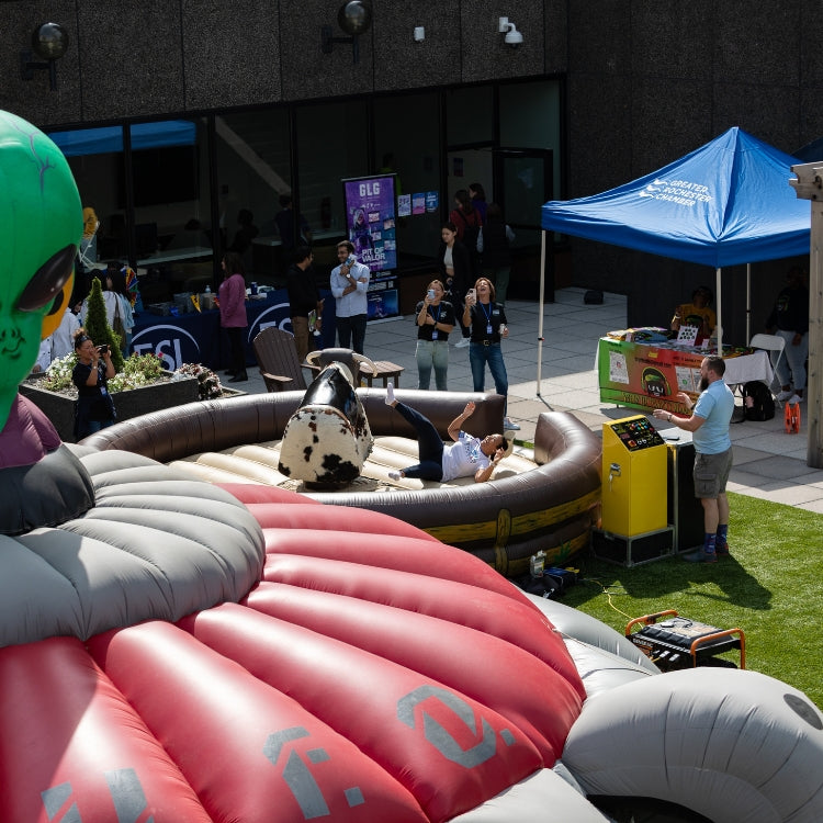 Mechanical Bull Riding with Inflatable Base Rental for Events in Rochester, NY