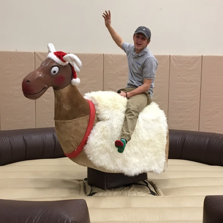 Man Riding Mechanical Reindeer Rental at Event in Buffalo, NY