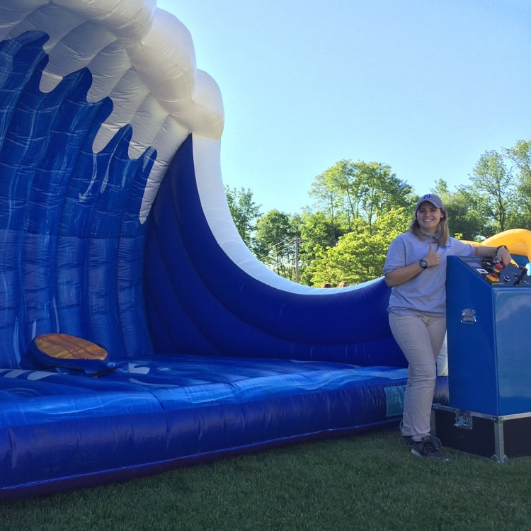 Blue Apple Attendant with Big Wave Mechanical Surfboard Ride Rental in Rochester, NY