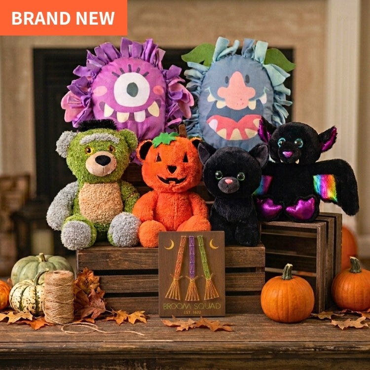 A display of completed Halloween DIY Crafts including Fleece-Tie Monsters, Plush Animals and String Art.