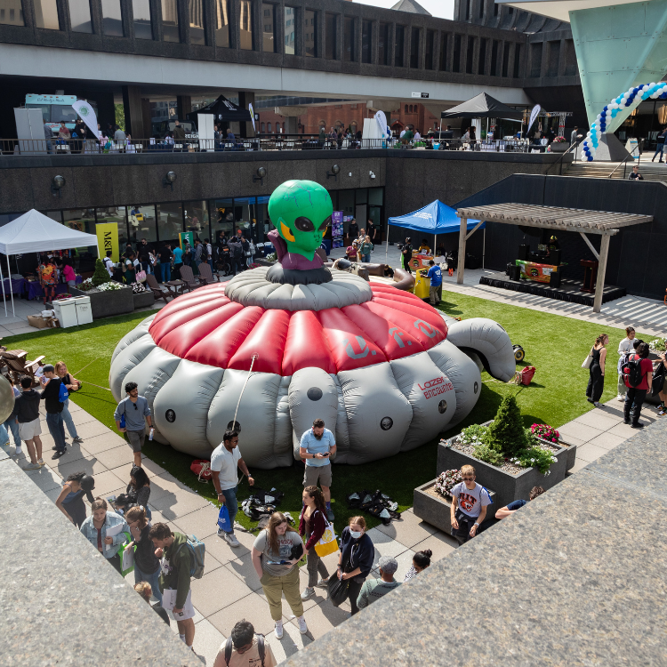 UFO Laser Tag Arena Inflatable Setup At An Event in Downtown Rochester, NY